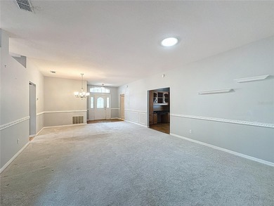 Price Reduction of $20,000. Rare St Regis model with 2.5 car on Kings Ridge Golf Club in Florida - for sale on GolfHomes.com, golf home, golf lot