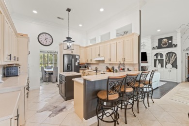 Situated within the gated community of Regatta Bay, this on Regatta Bay Golf and Country Club in Florida - for sale on GolfHomes.com, golf home, golf lot