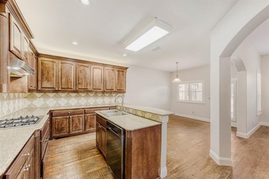 This property features numerous recent updates, including a salt on Woodbridge Golf Club in Texas - for sale on GolfHomes.com, golf home, golf lot