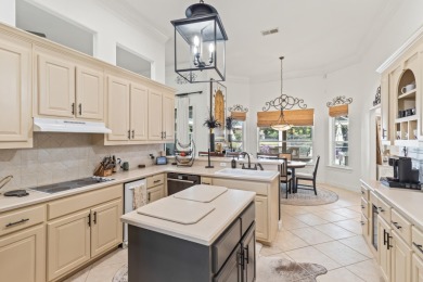 Situated within the gated community of Regatta Bay, this on Regatta Bay Golf and Country Club in Florida - for sale on GolfHomes.com, golf home, golf lot