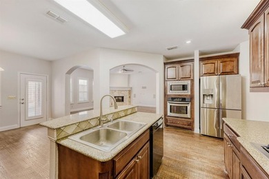 This property features numerous recent updates, including a salt on Woodbridge Golf Club in Texas - for sale on GolfHomes.com, golf home, golf lot