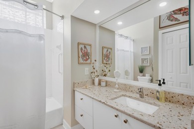 Live the dream in this gorgeous 2 bedroom, 2 bath, plus den on Rosedale Golf and Tennis Club in Florida - for sale on GolfHomes.com, golf home, golf lot