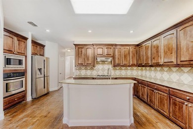 This property features numerous recent updates, including a salt on Woodbridge Golf Club in Texas - for sale on GolfHomes.com, golf home, golf lot