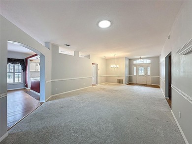 Price Reduction of $20,000. Rare St Regis model with 2.5 car on Kings Ridge Golf Club in Florida - for sale on GolfHomes.com, golf home, golf lot