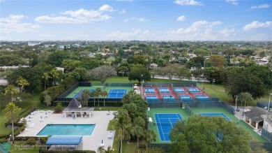 Beautiful water view 2/2 condo is presented to you with enclosed on Wynmoor Golf Course in Florida - for sale on GolfHomes.com, golf home, golf lot