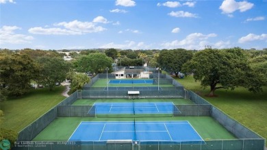 Beautiful water view 2/2 condo is presented to you with enclosed on Wynmoor Golf Course in Florida - for sale on GolfHomes.com, golf home, golf lot