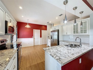 Price Reduction of $20,000. Rare St Regis model with 2.5 car on Kings Ridge Golf Club in Florida - for sale on GolfHomes.com, golf home, golf lot