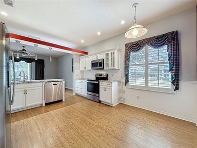 Price Reduction of $20,000. Rare St Regis model with 2.5 car on Kings Ridge Golf Club in Florida - for sale on GolfHomes.com, golf home, golf lot