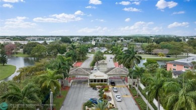 Beautiful water view 2/2 condo is presented to you with enclosed on Wynmoor Golf Course in Florida - for sale on GolfHomes.com, golf home, golf lot