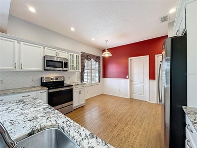 Price Reduction of $20,000. Rare St Regis model with 2.5 car on Kings Ridge Golf Club in Florida - for sale on GolfHomes.com, golf home, golf lot