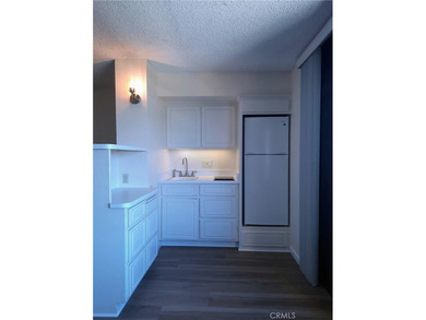 Beautiful view from this Towers 'A' studio on the 9th floor on Leisure Village Par 3 Golf Course in California - for sale on GolfHomes.com, golf home, golf lot