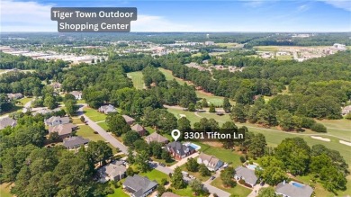 Overlooking the scenic fairways of Saugahatchee Golf Course on Saugahatchee Country Club in Alabama - for sale on GolfHomes.com, golf home, golf lot