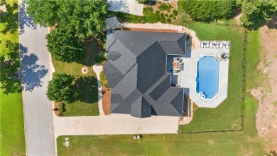 Overlooking the scenic fairways of Saugahatchee Golf Course on Saugahatchee Country Club in Alabama - for sale on GolfHomes.com, golf home, golf lot