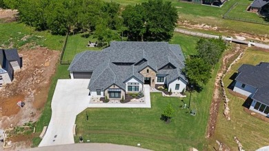 Experience the epitome of luxury living in the prestigious gated on The Patriot in Oklahoma - for sale on GolfHomes.com, golf home, golf lot
