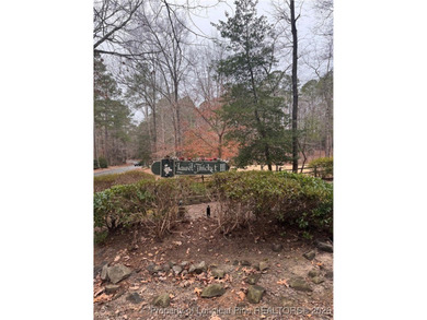 Build your next home on this .21 acre lot located in the on Carolina Trace Country Club in North Carolina - for sale on GolfHomes.com, golf home, golf lot
