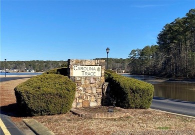 Build your next home on this .21 acre lot located in the on Carolina Trace Country Club in North Carolina - for sale on GolfHomes.com, golf home, golf lot