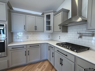 Step into this incredible custom-built home at 4225 Windsong on  in Wyoming - for sale on GolfHomes.com, golf home, golf lot