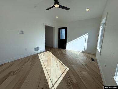 Step into this incredible custom-built home at 4225 Windsong on  in Wyoming - for sale on GolfHomes.com, golf home, golf lot