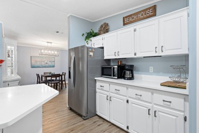 Step into this warm and welcoming 2 bed/ 2 bath completely on Spanish Lakes Fairways in Florida - for sale on GolfHomes.com, golf home, golf lot