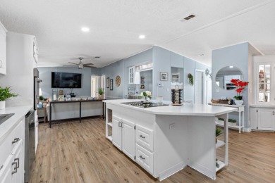 Step into this warm and welcoming 2 bed/ 2 bath completely on Spanish Lakes Fairways in Florida - for sale on GolfHomes.com, golf home, golf lot