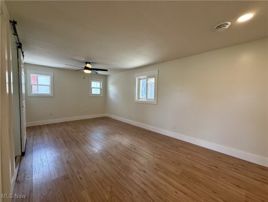 Step into quiet luxury with this beautifully rebuilt 3-bedroom on Pine Lakes Golf Club in Ohio - for sale on GolfHomes.com, golf home, golf lot