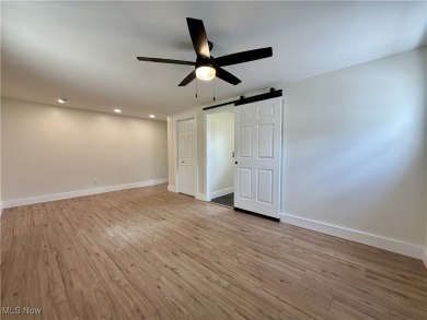 Step into quiet luxury with this beautifully rebuilt 3-bedroom on Pine Lakes Golf Club in Ohio - for sale on GolfHomes.com, golf home, golf lot