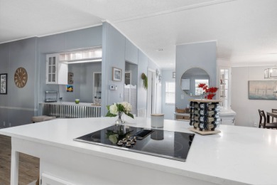 Step into this warm and welcoming 2 bed/ 2 bath completely on Spanish Lakes Fairways in Florida - for sale on GolfHomes.com, golf home, golf lot
