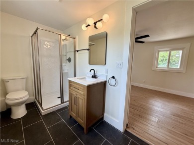 Step into quiet luxury with this beautifully rebuilt 3-bedroom on Pine Lakes Golf Club in Ohio - for sale on GolfHomes.com, golf home, golf lot