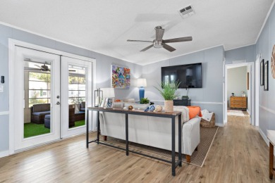 Step into this warm and welcoming 2 bed/ 2 bath completely on Spanish Lakes Fairways in Florida - for sale on GolfHomes.com, golf home, golf lot