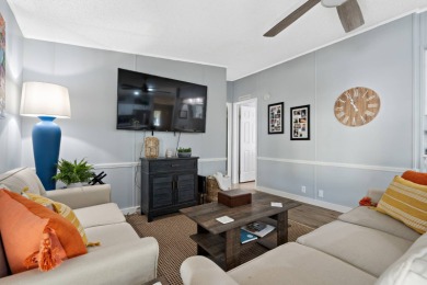 Step into this warm and welcoming 2 bed/ 2 bath completely on Spanish Lakes Fairways in Florida - for sale on GolfHomes.com, golf home, golf lot
