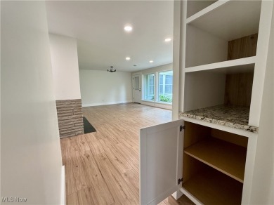 Step into quiet luxury with this beautifully rebuilt 3-bedroom on Pine Lakes Golf Club in Ohio - for sale on GolfHomes.com, golf home, golf lot