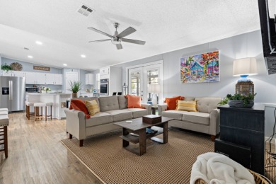 Step into this warm and welcoming 2 bed/ 2 bath completely on Spanish Lakes Fairways in Florida - for sale on GolfHomes.com, golf home, golf lot