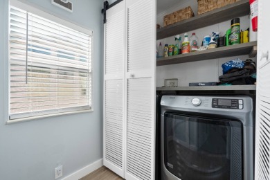 Step into this warm and welcoming 2 bed/ 2 bath completely on Spanish Lakes Fairways in Florida - for sale on GolfHomes.com, golf home, golf lot