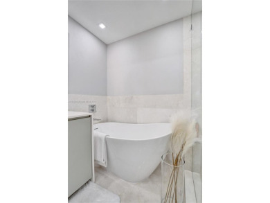 Luxurious and professionally decorated 2 bedroom/2 bathroom unit on Turnberry Isle Resort and Club in Florida - for sale on GolfHomes.com, golf home, golf lot