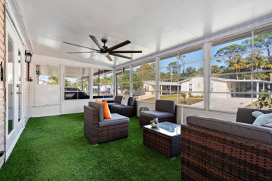 Step into this warm and welcoming 2 bed/ 2 bath completely on Spanish Lakes Fairways in Florida - for sale on GolfHomes.com, golf home, golf lot