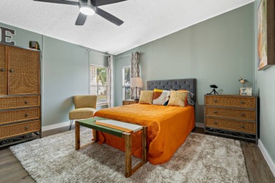 Step into this warm and welcoming 2 bed/ 2 bath completely on Spanish Lakes Fairways in Florida - for sale on GolfHomes.com, golf home, golf lot