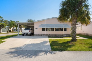 Step into this warm and welcoming 2 bed/ 2 bath completely on Spanish Lakes Fairways in Florida - for sale on GolfHomes.com, golf home, golf lot