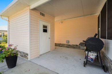 Step into this warm and welcoming 2 bed/ 2 bath completely on Spanish Lakes Fairways in Florida - for sale on GolfHomes.com, golf home, golf lot