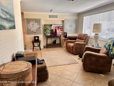 Discover move-in-ready convenience in this charming 2-bedroom on Heritage Pines Country Club in Florida - for sale on GolfHomes.com, golf home, golf lot