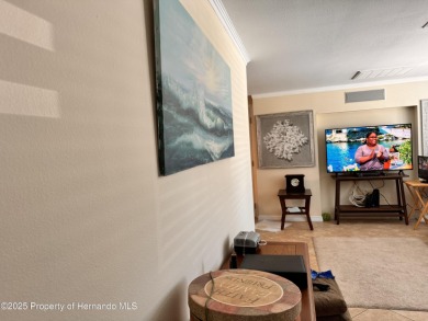 Discover move-in-ready convenience in this charming 2-bedroom on Heritage Pines Country Club in Florida - for sale on GolfHomes.com, golf home, golf lot