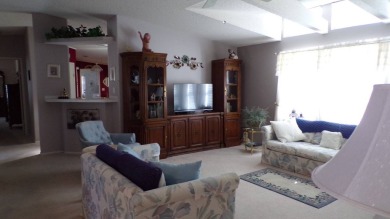 Embrace the allure of this remarkable 3-bedroom home, nestled on Schalamar Creek Golf and Country Club in Florida - for sale on GolfHomes.com, golf home, golf lot