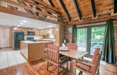 Welcome to Timber Cottage - This charming log home, built in on Apple Valley Golf Course in Ohio - for sale on GolfHomes.com, golf home, golf lot