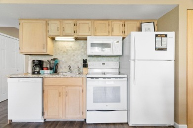 Fantastic fully furnished condo just steps from Lake Taneycomo! on Pointe Royale Village Country Club in Missouri - for sale on GolfHomes.com, golf home, golf lot