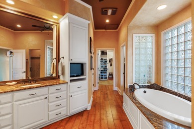 This stunning, custom-built two-story home is perched on Apple on Ram Rock Golf Course in Texas - for sale on GolfHomes.com, golf home, golf lot