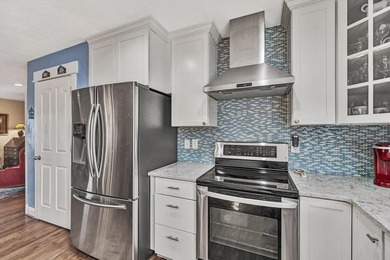 Beautiful, custom-built lake access home located on one of the on Mariners Landing Golf and Country Club in Virginia - for sale on GolfHomes.com, golf home, golf lot