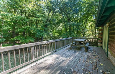 Welcome to Timber Cottage - This charming log home, built in on Apple Valley Golf Course in Ohio - for sale on GolfHomes.com, golf home, golf lot