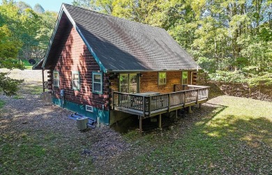 Welcome to Timber Cottage - This charming log home, built in on Apple Valley Golf Course in Ohio - for sale on GolfHomes.com, golf home, golf lot