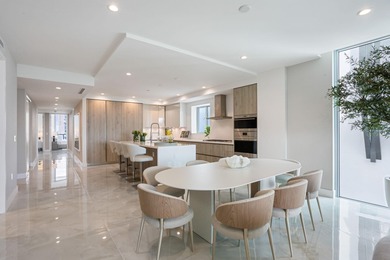 NEW FOUR BEDROOM PLUS DEN, HALF-FLOOR RESIDENCE IN THE HEART OF on Boca Raton Resort and Club in Florida - for sale on GolfHomes.com, golf home, golf lot