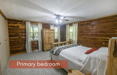 Welcome to Timber Cottage - This charming log home, built in on Apple Valley Golf Course in Ohio - for sale on GolfHomes.com, golf home, golf lot