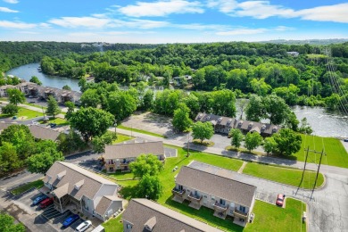 Fantastic fully furnished condo just steps from Lake Taneycomo! on Pointe Royale Village Country Club in Missouri - for sale on GolfHomes.com, golf home, golf lot